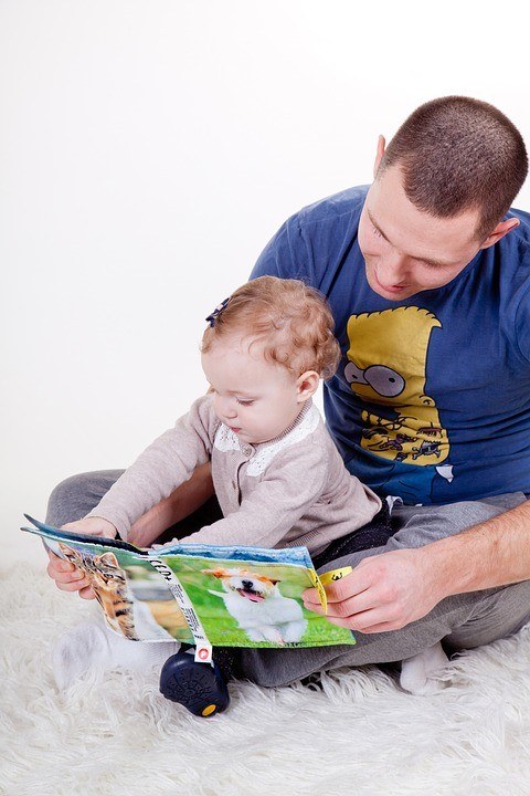 Dad with child reading.jpg