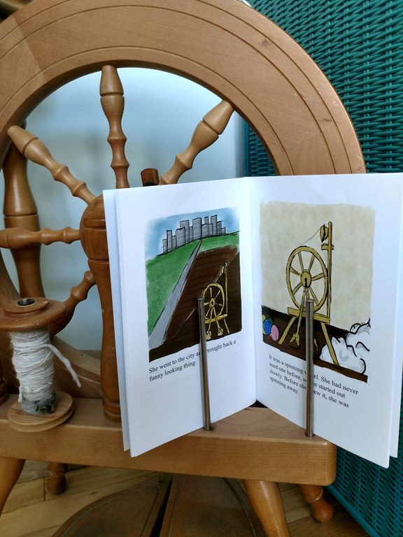Renee's book on sinning wheel.jpg