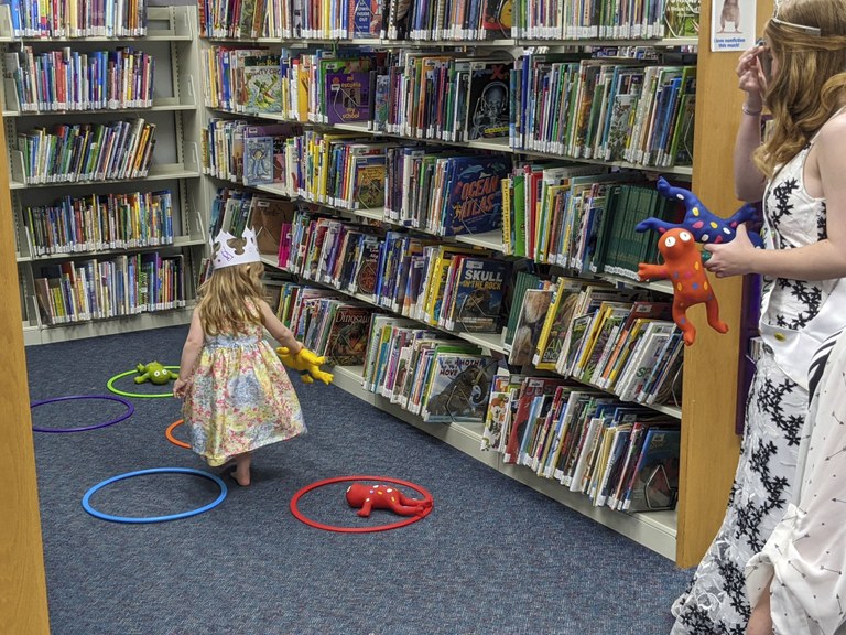 Child playing frog toss.jpg