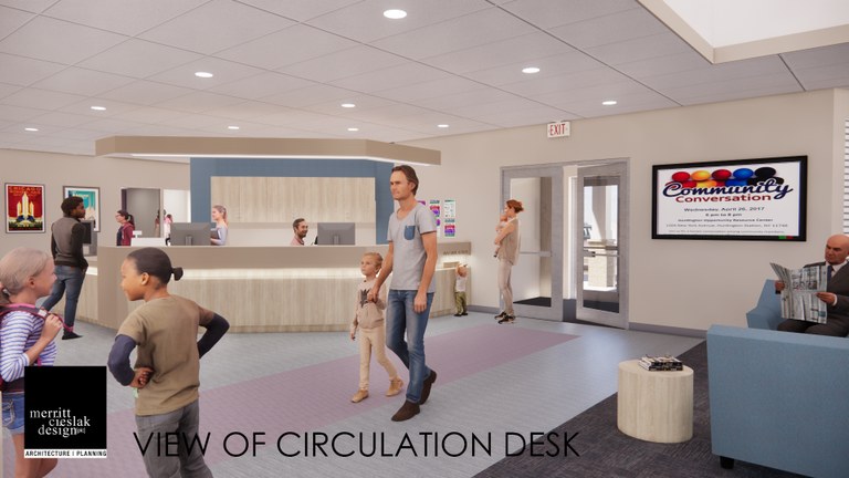 Patrons in the library, with the circulation desk in the background