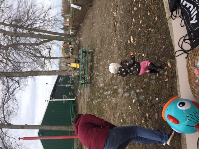 Toddler catching bubbles 3.JPG